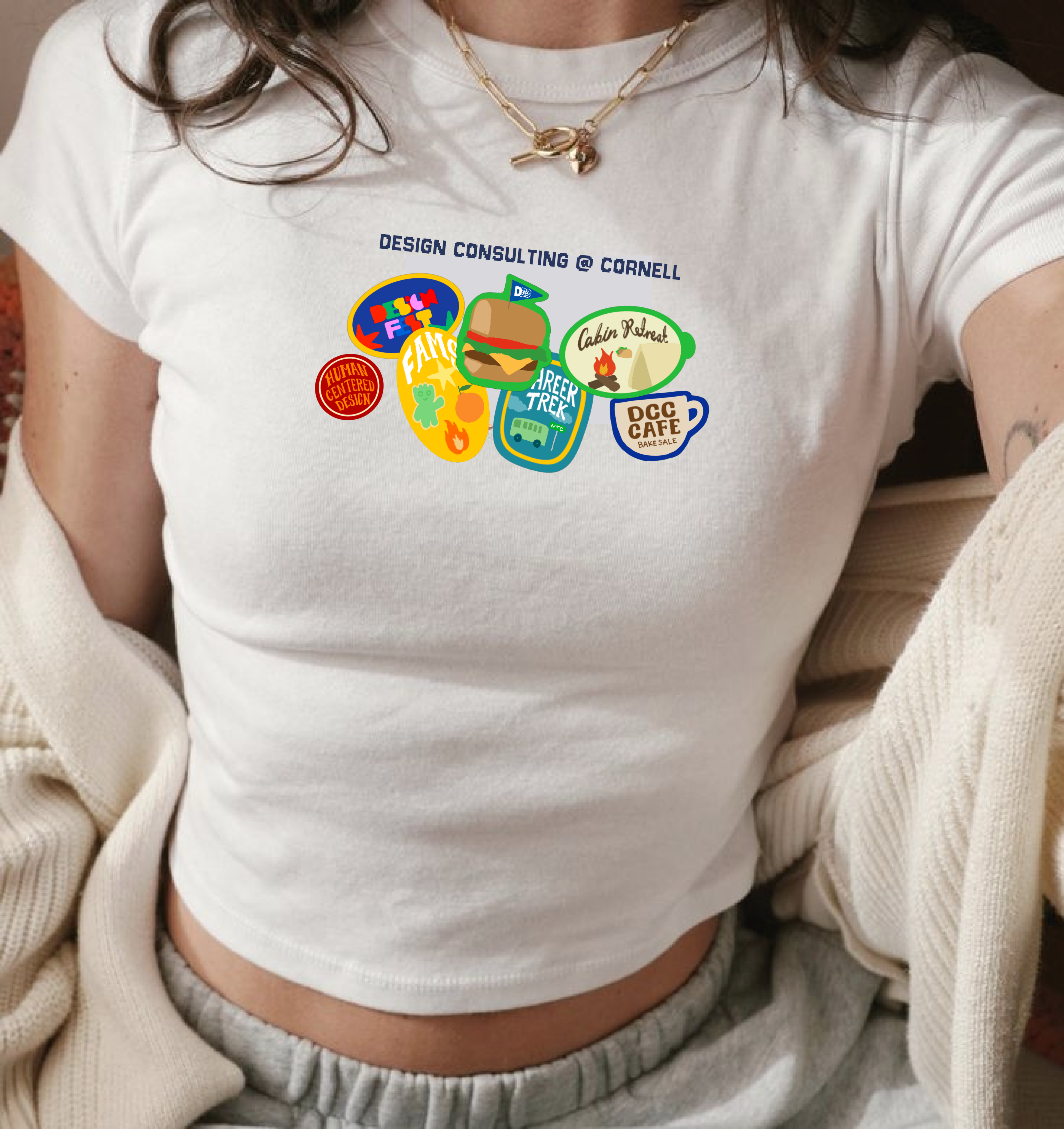 A white T-shirt printed with colorful club icons