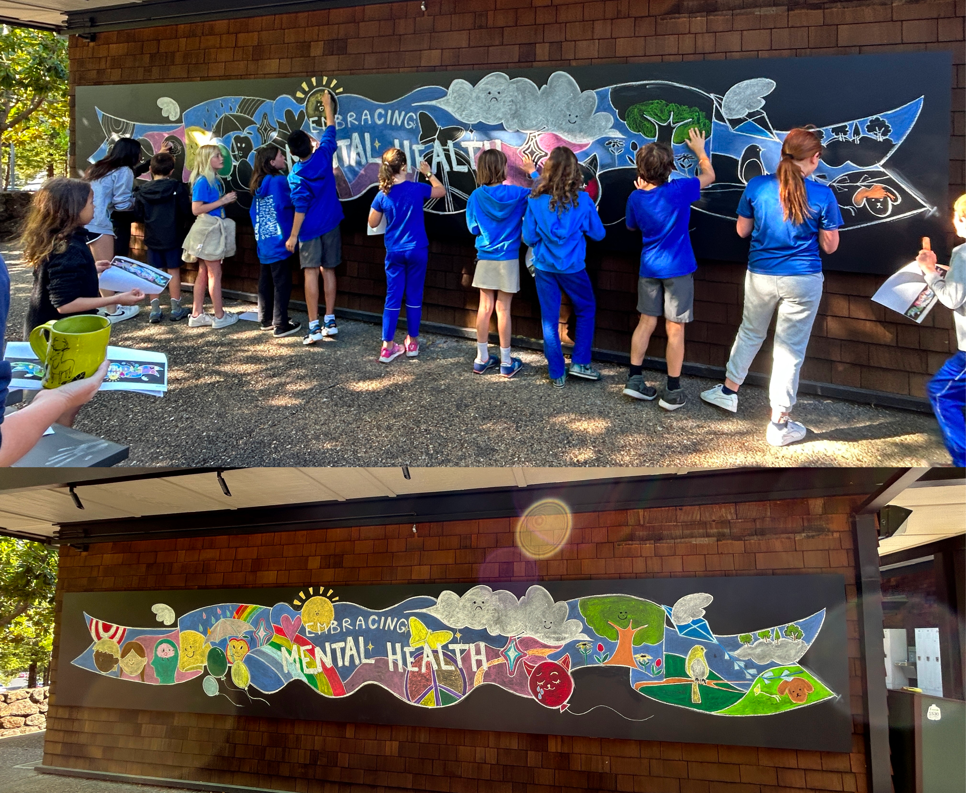 Children painting a colorful outdoor mural on a long wooden wall